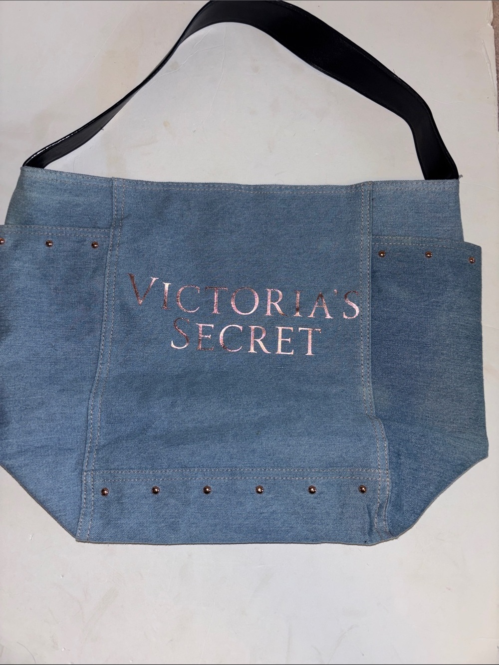 VICTORIA SECRETS DENIM TOTE ROSE GOLD COLORED STUDS PINK METALLIC LETTERING